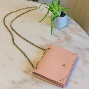 Pale salmon colored crossbody bag